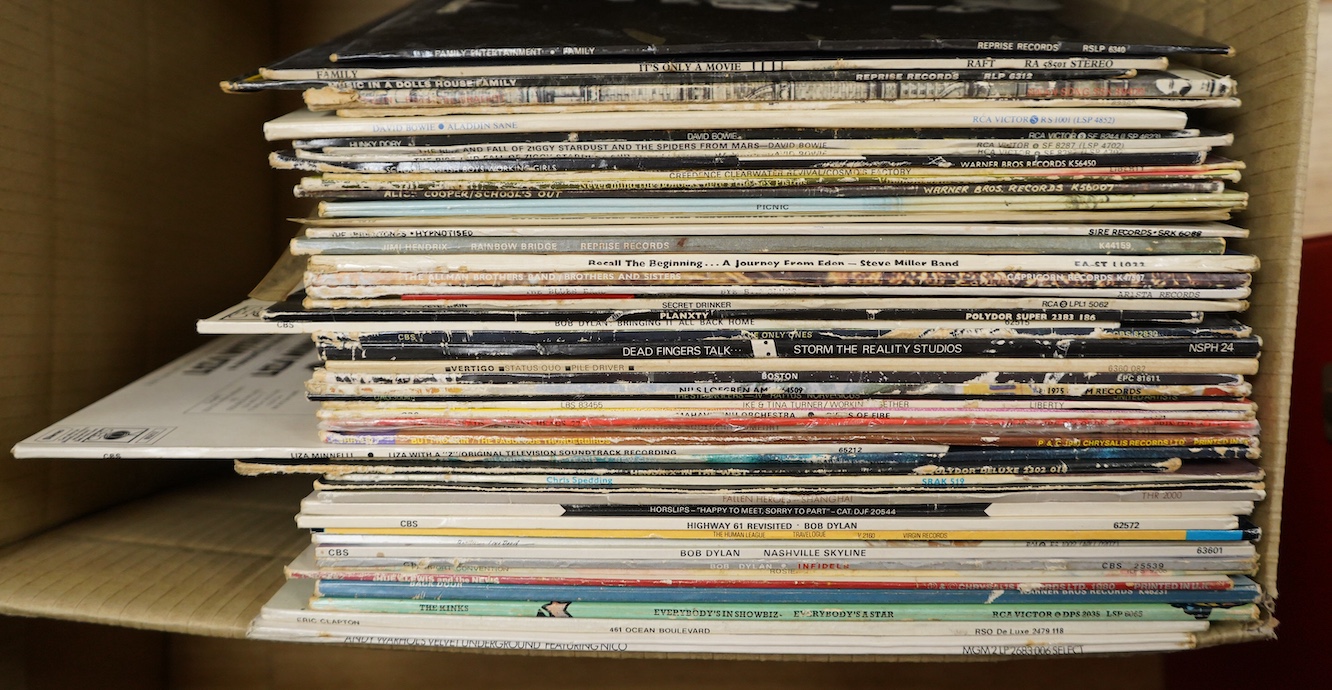 Fifty-four 1970s LP record albums, artists include; Family; Family Entertainment (complete with poster), It’s Only a Movie, Music in Doll’s House, together with Led Zeppelin; Physical Graffiti, David Bowie; the Man Who S
